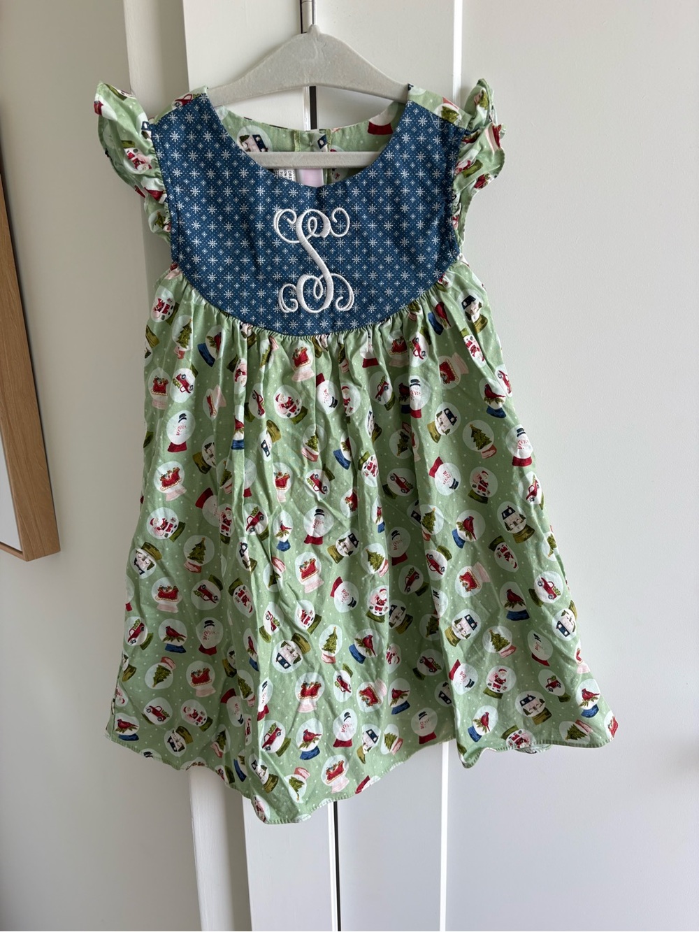 Ric Rac & Ruffles Holiday Print Dress with Embroidered “S”